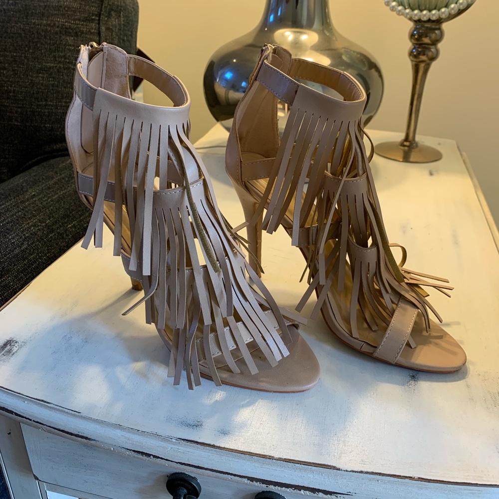 Nude fringe heels